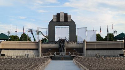 Installation of supplementary projection surfaces on site at the Memorial in preparation for the event.