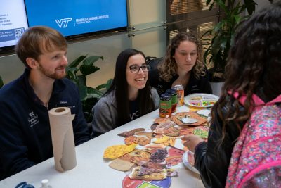 Virginia Tech students interact with Kids' Tech University participants