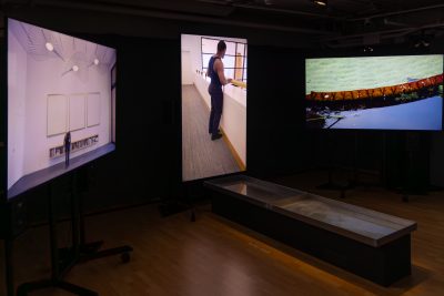 Photo of Hidden Within, a multi-screen art installation that uses synchronized video, objects, and sound. Part of CCI CyberArts Exhibit 2024